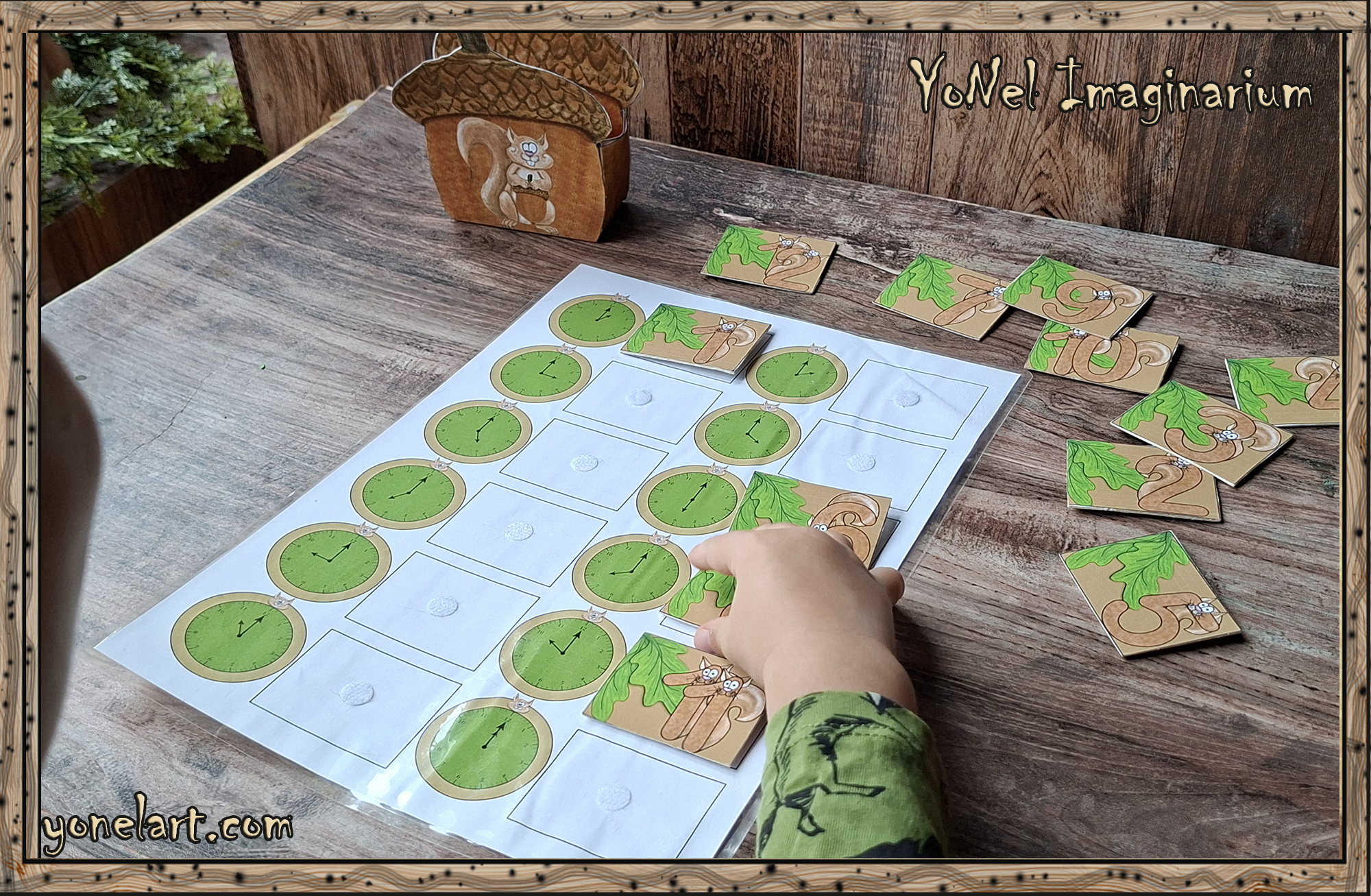 Child matching time cards on a printable learning board while learning to tell time with Ham the squirrel